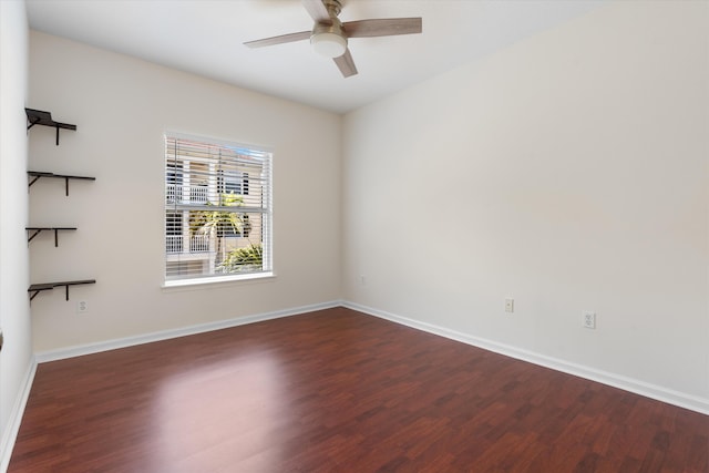 826 Dakota Dr Unit 105, Jupiter, FL 33458 - unfurnished room with wood finished floors, a ceiling fan, and baseboards
