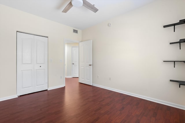 826 Dakota Dr Unit 105, Jupiter, FL 33458 - unfurnished bedroom featuring wood finished floors and baseboards