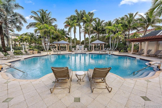 826 Dakota Dr Unit 105, Jupiter, FL 33458 - community pool featuring a gazebo and a patio