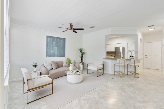 826 Dakota Dr Unit 105, Jupiter, FL 33458 - living room featuring crown molding, ceiling fan, and baseboards