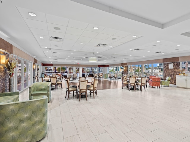 dining room with recessed lighting, visible vents, and a drop ceiling