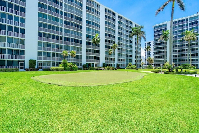 surrounding community with a lawn