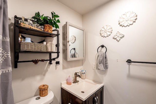 half bath with toilet and vanity