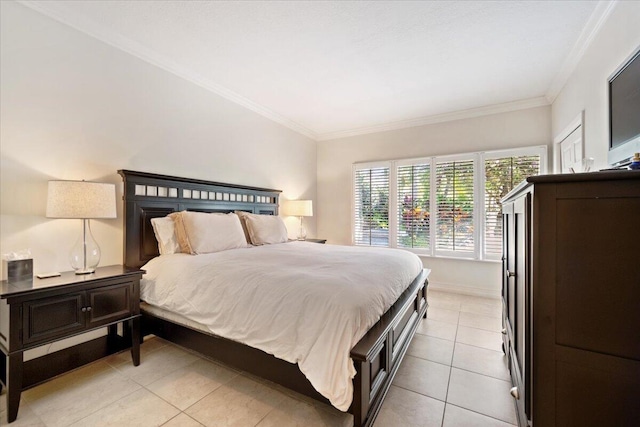 bedroom with baseboards, light tile patterned flooring, and crown molding