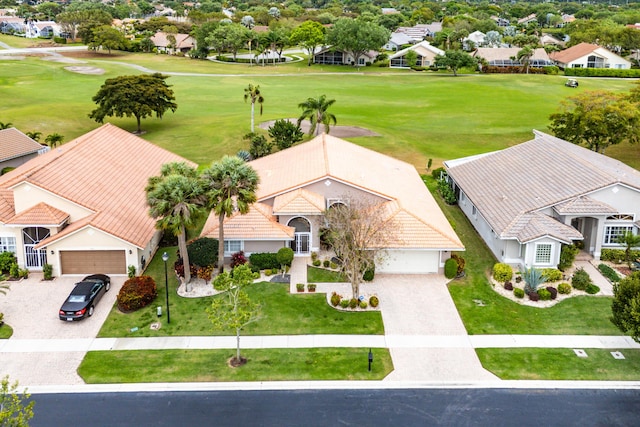 birds eye view of property with a residential view and view of golf course