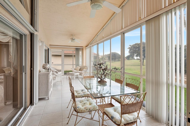 sunroom / solarium with vaulted ceiling and ceiling fan