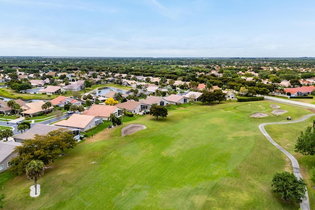 birds eye view of property with a residential view and view of golf course