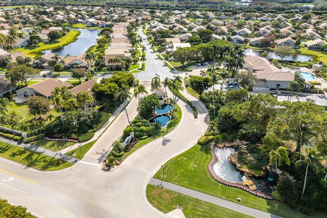 aerial view featuring a residential view and a water view