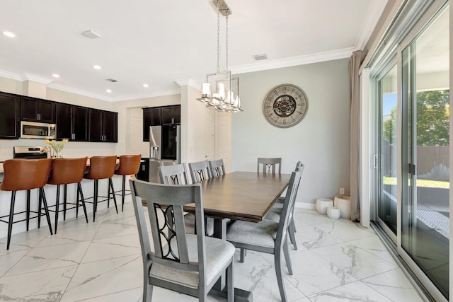 dining area featuring a chandelier, marble finish floor, baseboards, and ornamental molding