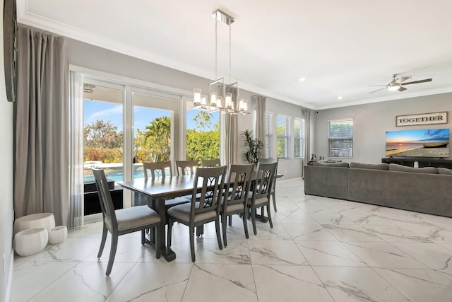 dining room featuring recessed lighting, marble finish floor, crown molding, and ceiling fan with notable chandelier