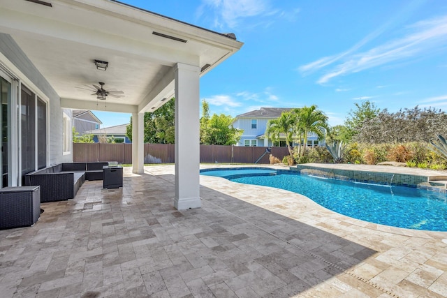 view of swimming pool with a patio, a fenced backyard, a fenced in pool, an outdoor hangout area, and ceiling fan