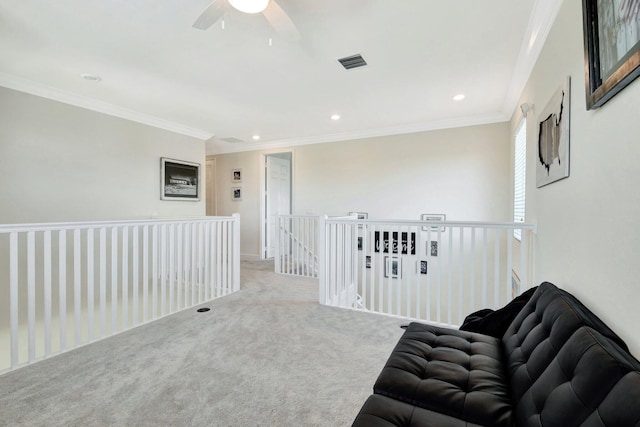 sitting room with visible vents, ornamental molding, recessed lighting, carpet, and ceiling fan