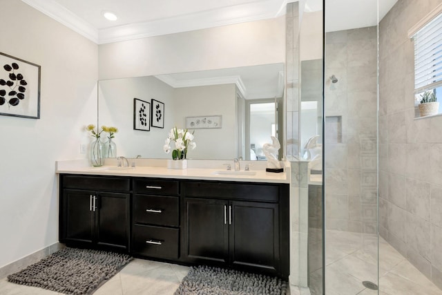 full bathroom featuring a sink, double vanity, crown molding, and a tile shower