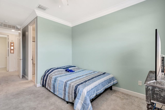 bedroom with carpet flooring, baseboards, visible vents, and ornamental molding