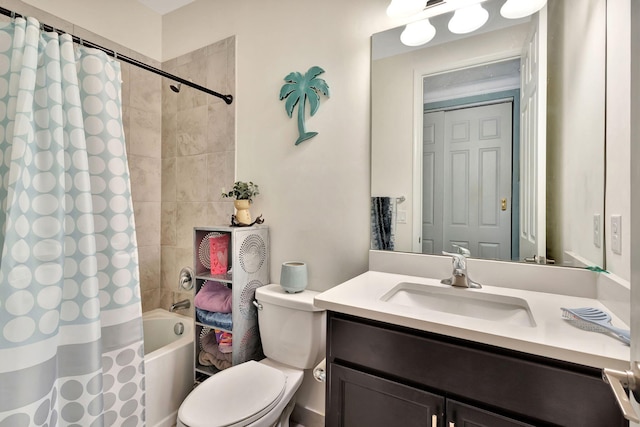 full bath with vanity, shower / tub combo, and toilet