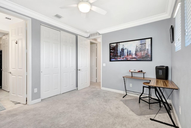 office area with ceiling fan, carpet, visible vents, and ornamental molding