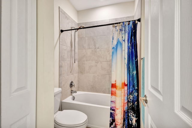 bathroom with toilet and shower / bathtub combination with curtain