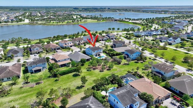 1009 Sterling Pine Pl, Loxahatchee, FL 33470 - bird's eye view featuring a water view and a residential view