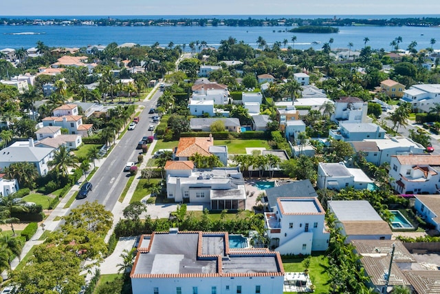 bird's eye view featuring a residential view and a water view