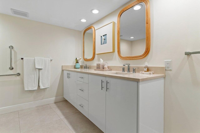 bathroom with tile patterned floors, visible vents, recessed lighting, baseboards, and vanity