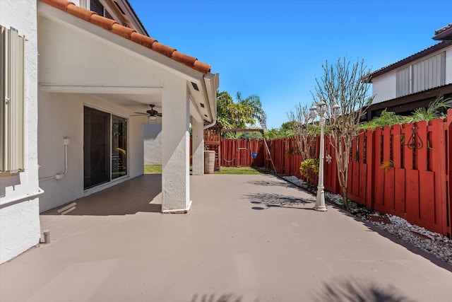 view of patio / terrace featuring a ceiling fan and a fenced backyard