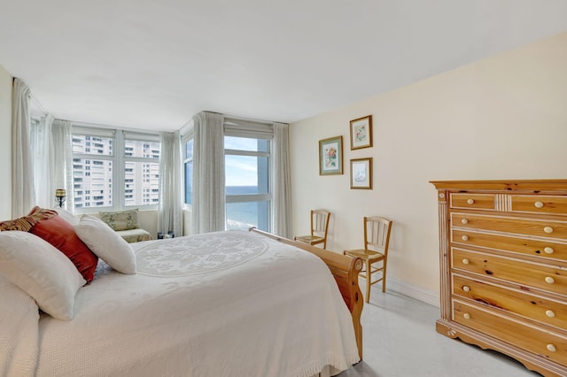 bedroom featuring baseboards