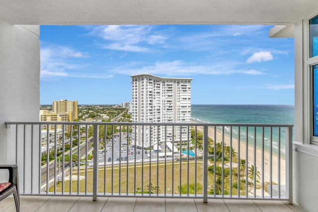 balcony with a city view and a water view