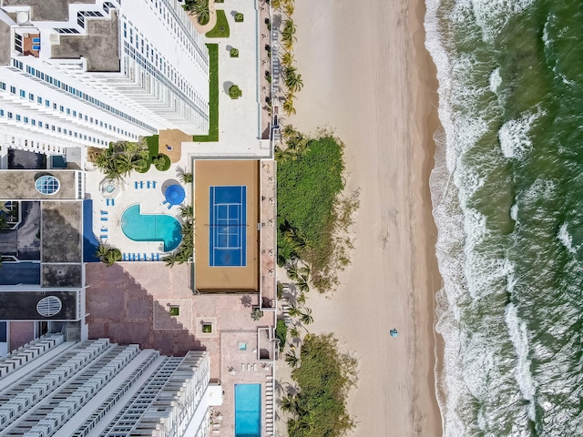 bird's eye view with a beach view and a water view