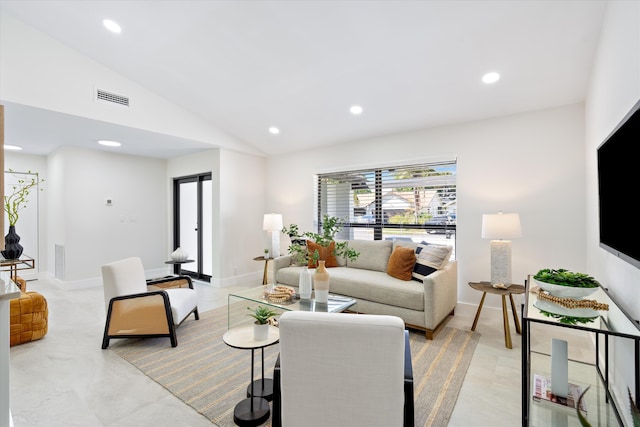 living area featuring visible vents, recessed lighting, and lofted ceiling