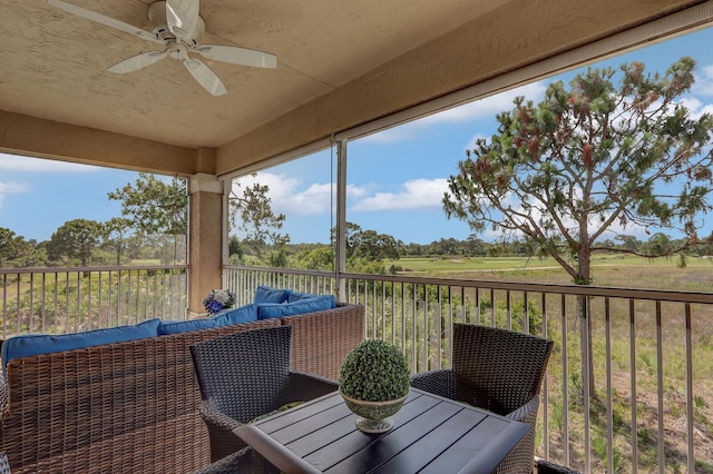 8290 Mulligan Cir Unit 2421, Port Saint Lucie, FL 34986 - sunroom with a ceiling fan, plenty of natural light, and outdoor lounge area