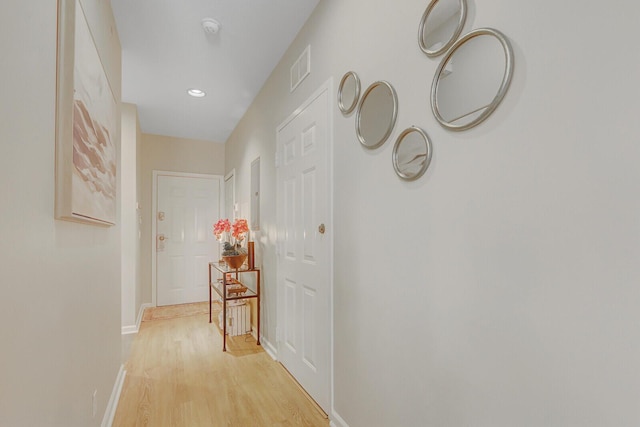 8290 Mulligan Cir Unit 2421, Port Saint Lucie, FL 34986 - hall featuring light wood-type flooring, baseboards, and recessed lighting