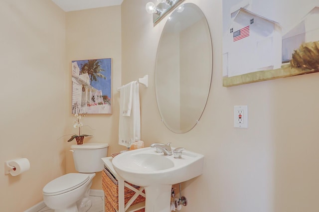 8290 Mulligan Cir Unit 2421, Port Saint Lucie, FL 34986 - half bathroom with toilet and baseboards