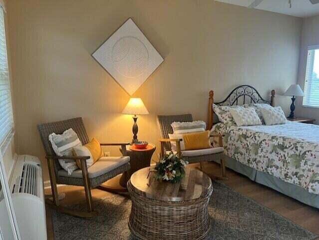 8290 Mulligan Cir Unit 2421, Port Saint Lucie, FL 34986 - bedroom featuring wood finished floors