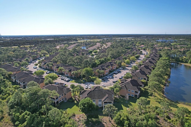 8290 Mulligan Cir Unit 2421, Port Saint Lucie, FL 34986 - aerial view of property and surrounding area featuring a large body of water and nearby suburban area