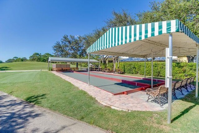 8290 Mulligan Cir Unit 2421, Port Saint Lucie, FL 34986 - view of property's community featuring a game area