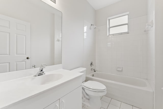 full bath with tile patterned flooring, toilet, vanity, and shower / bath combination