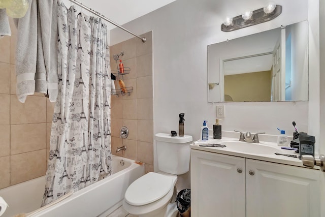 bathroom with shower / bathtub combination with curtain, toilet, and vanity