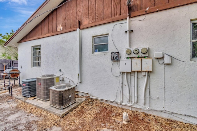 exterior space with central air condition unit and electric meter