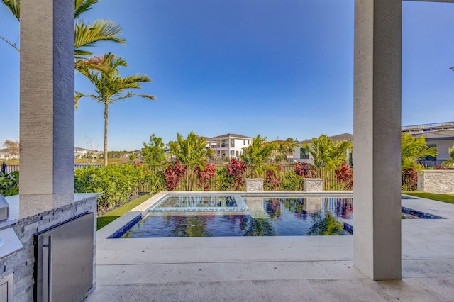 view of pool with fence