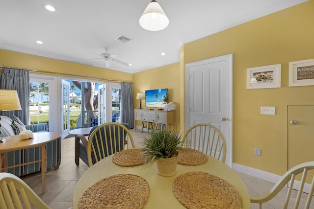 tiled dining area featuring recessed lighting, baseboards, ornamental molding, and a ceiling fan