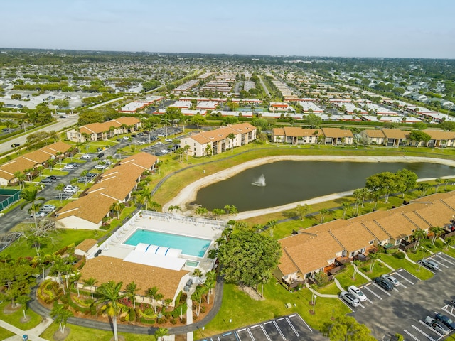 bird's eye view with a residential view and a water view