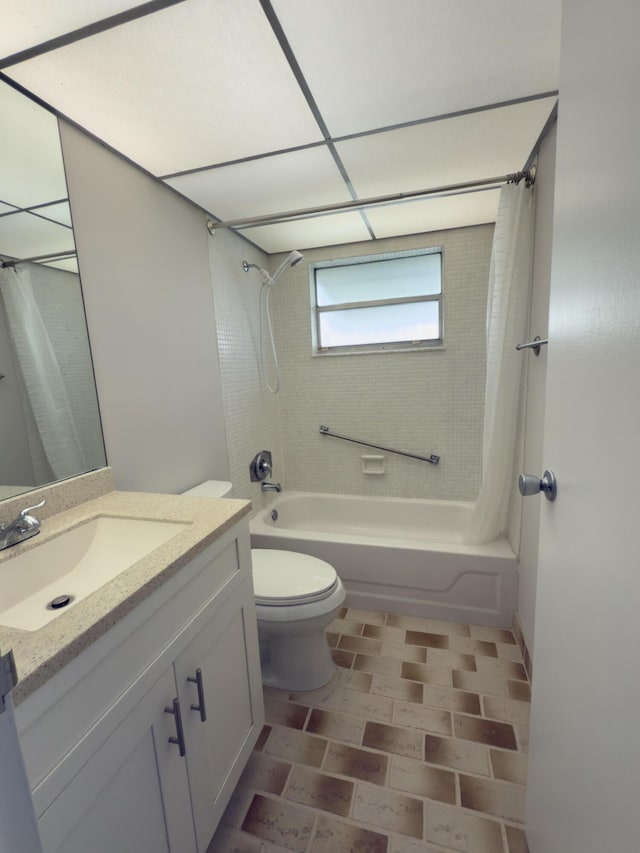 bathroom with vanity, toilet, and shower / tub combo