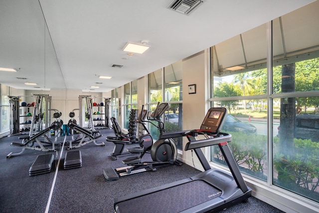 exercise room featuring visible vents