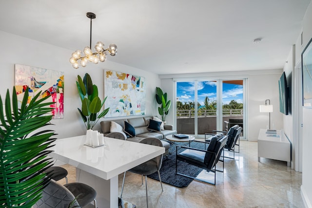 living area with an inviting chandelier