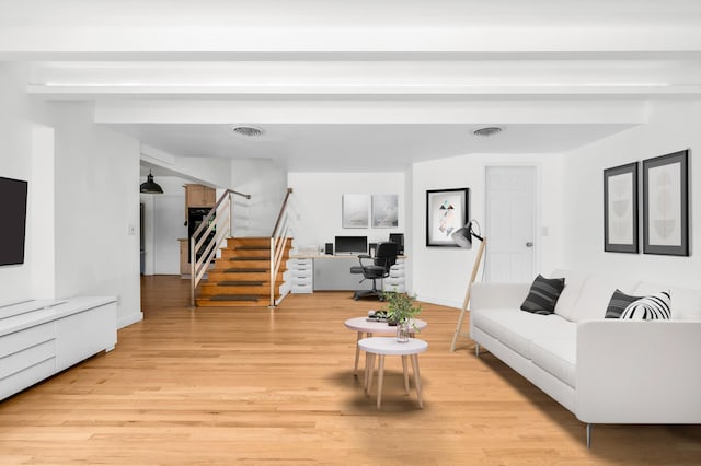 2601 NE 37th St, Fort Lauderdale, FL 33306 - living area featuring light wood-type flooring, stairway, and baseboards