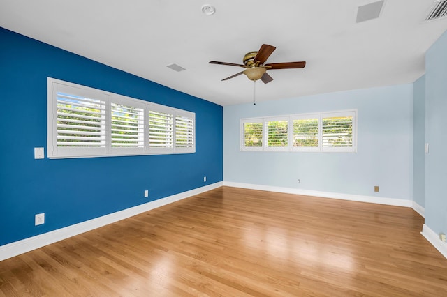 2601 NE 37th St, Fort Lauderdale, FL 33306 - empty room featuring a ceiling fan, baseboards, and light wood-style floors