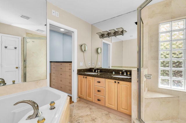 2601 NE 37th St, Fort Lauderdale, FL 33306 - full bath featuring a shower stall, a garden tub, and double vanity