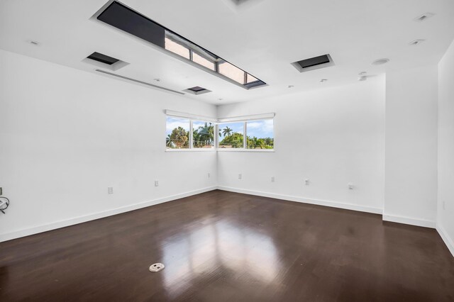 2601 NE 37th St, Fort Lauderdale, FL 33306 - empty room featuring wood finished floors and baseboards