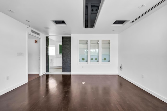 2601 NE 37th St, Fort Lauderdale, FL 33306 - empty room featuring wood finished floors and baseboards