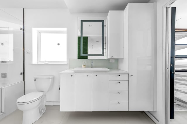 2601 NE 37th St, Fort Lauderdale, FL 33306 - full bathroom with toilet, vanity, and a shower
